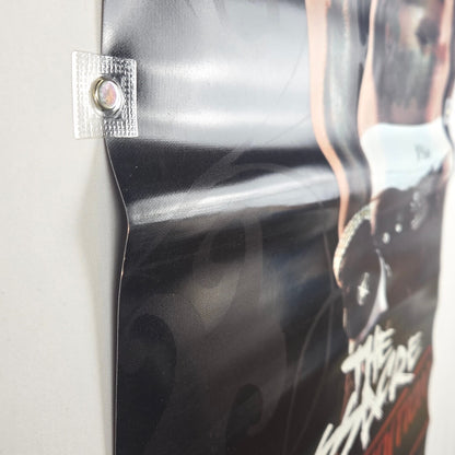 Close-up of a banner at an angle to show the bend in center of banner. 