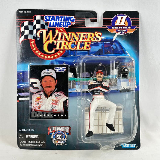 Action figure and collectible card in packaging against white background.