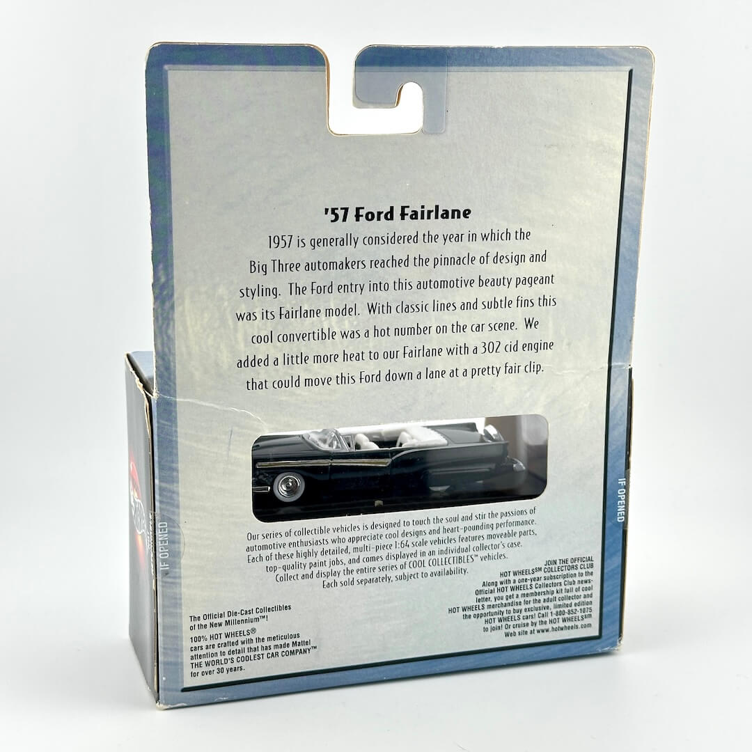 A boxed collectible vehicle package photographed against a plain white background. 