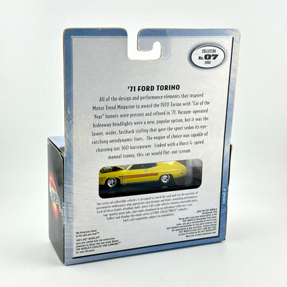 Back view of a packaged collectible model car in a silver and blue box, featuring printed text.