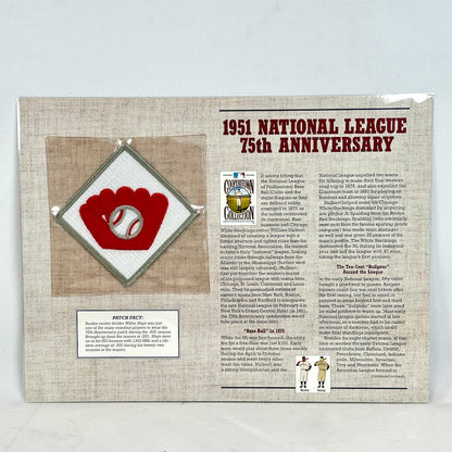 Memorabilia piece celebrating the 1951 National League 75th Anniversary with a red and white emblem on a beige background.