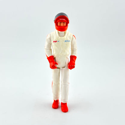 Action figure in a white suit with red accents on a light gray background