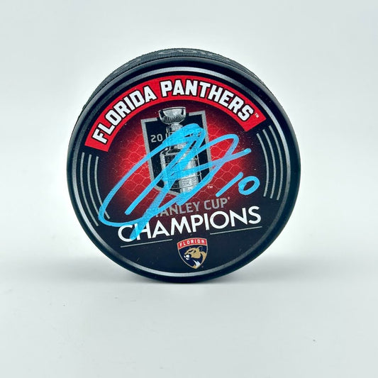 Hockey puck with Florida Panthers Stanley Cup Champions branding on a white background