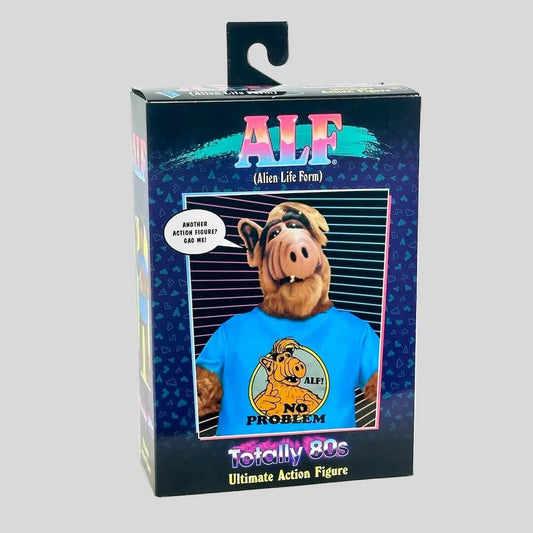 Boxed action figure of ALF with blue shirt and 'No Problem' graphic, on a white background