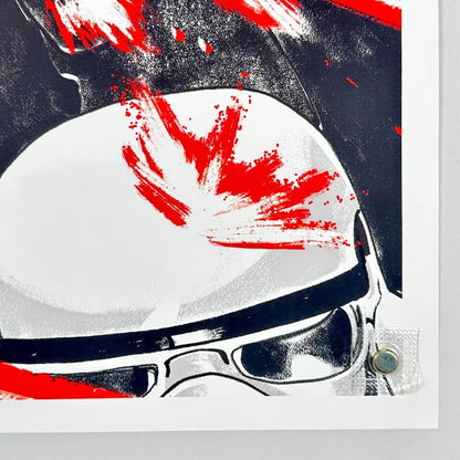 Abstract art piece with red, black, and white colors on a dark background