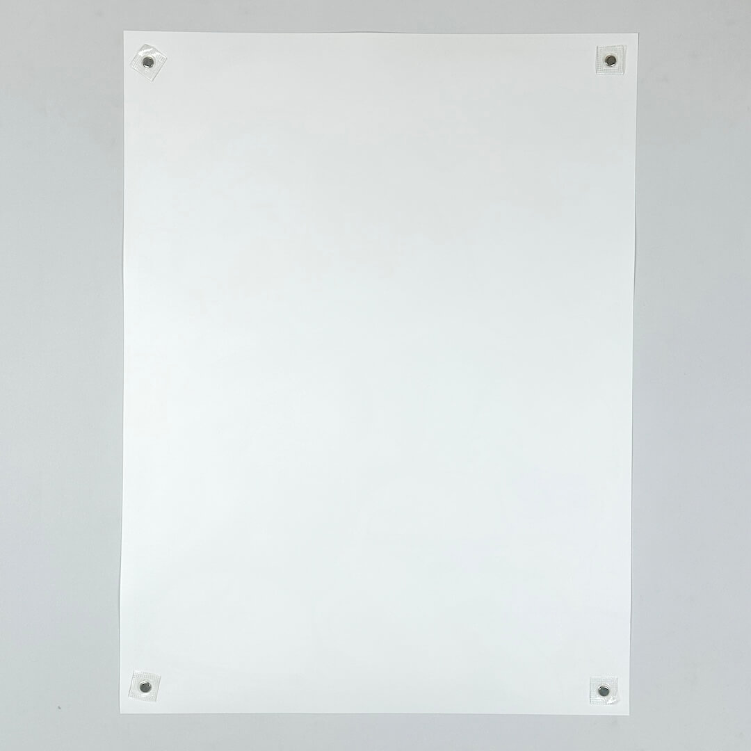 Backside of white poster against white background to show no damage.