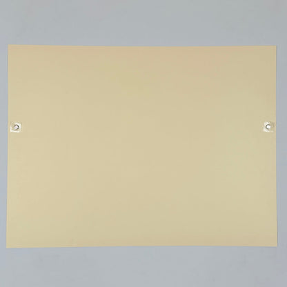 Backside of cream colored poster against white background. 