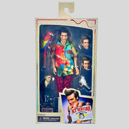 Action figure in packaging with character images and 'Ace Ventura' branding.
