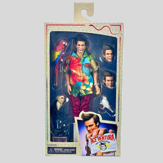Action figure in packaging with character images and 'Ace Ventura' branding.