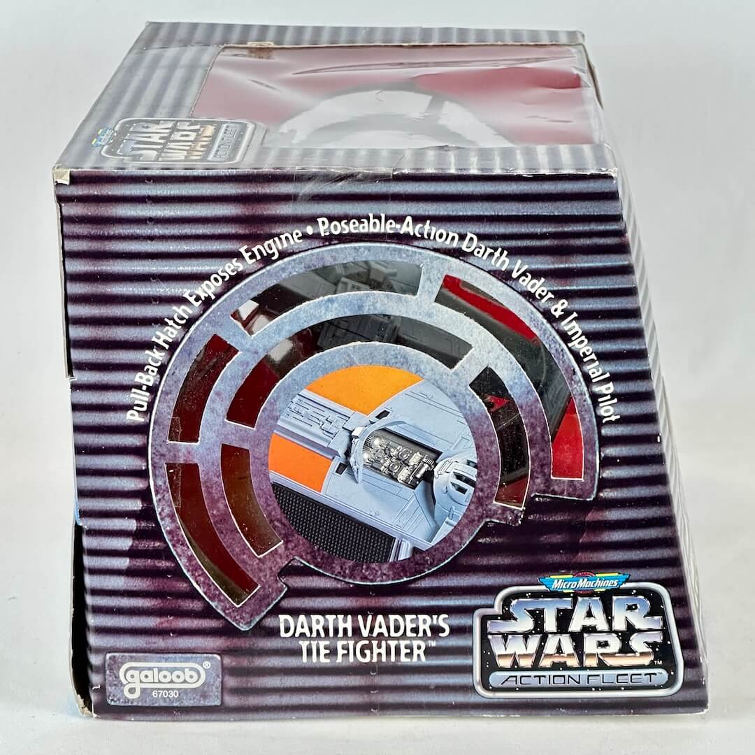 Star Wars Micro Machine Darth Vader's TIE Fighter ship in packaging with some damage to box. 