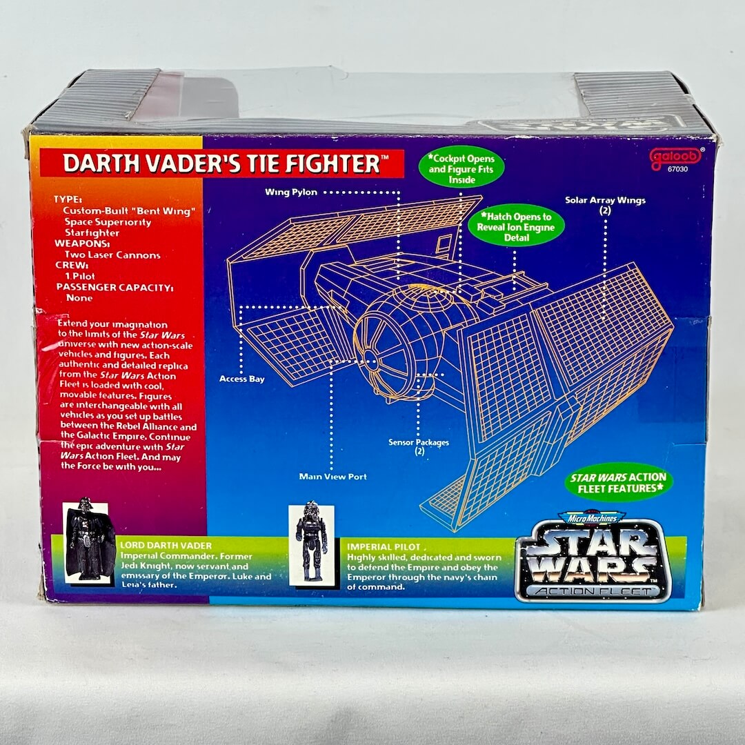 Star Wars Micro Machine Darth Vader's TIE Fighter ship in packaging with some damage to box. 