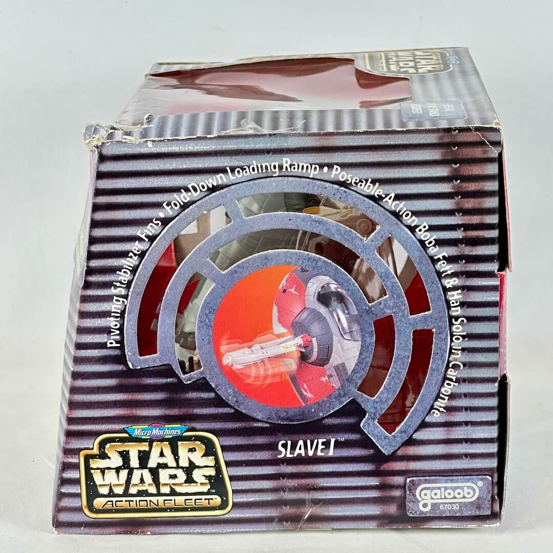 Star Wars Micro Machine Slave-1 ship in packaging with some damage to box. 