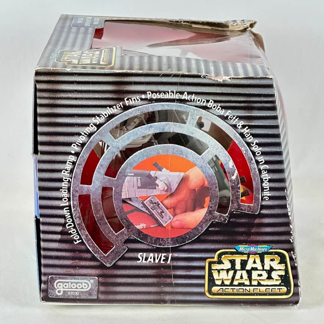 Star Wars Micro Machine Slave-1 ship in packaging with some damage to box. 