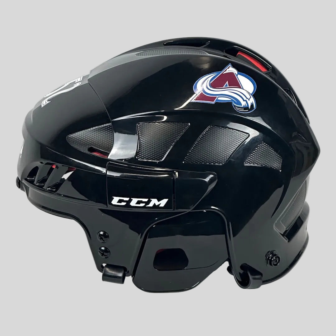 Black hockey helmet with a logo on a white background