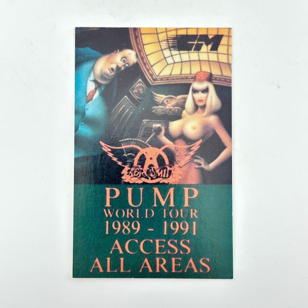 Promotional poster for 'Pump World Tour 1989-1991 Access All Areas'.featuring a woman and a man,