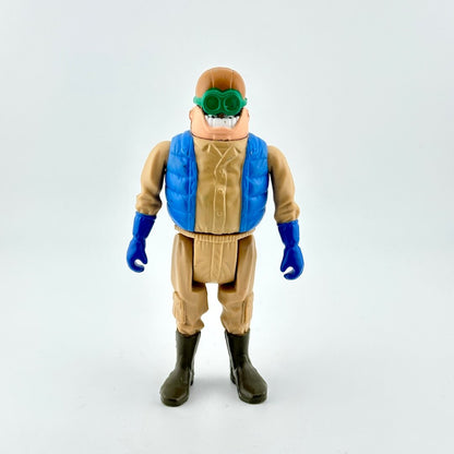 Action figure with a blue vest and green goggles on a white background