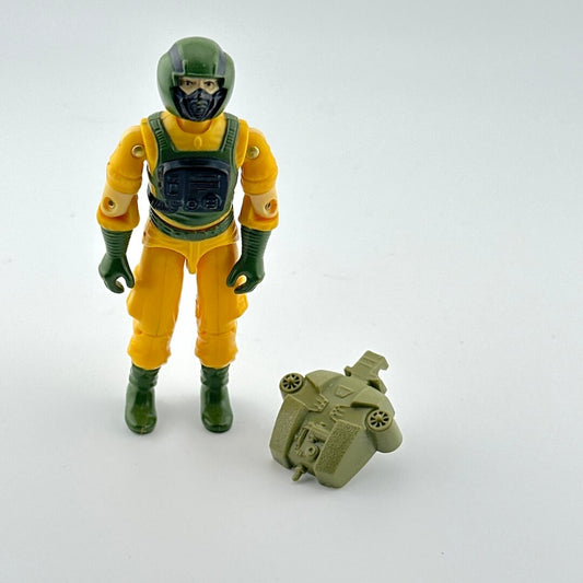 Action figure in yellow and green wetsuit with green pack against white background.