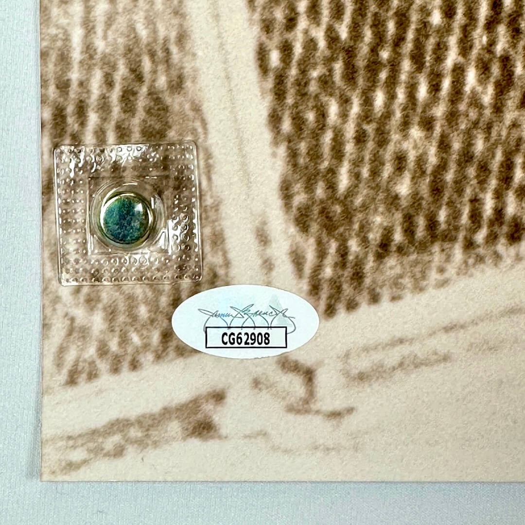 Close-up of bottom left corner to show pristine condition and JSA authentication sticker. 