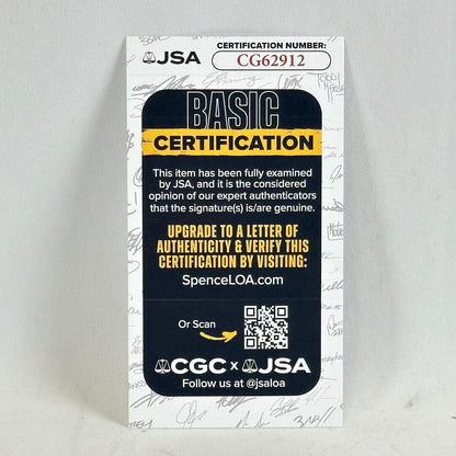JSA basic certification card photographed against white surface. 