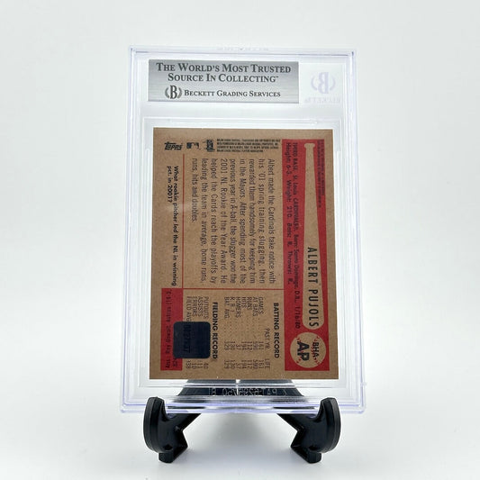 Baseball card in a clear protective case with a white background
