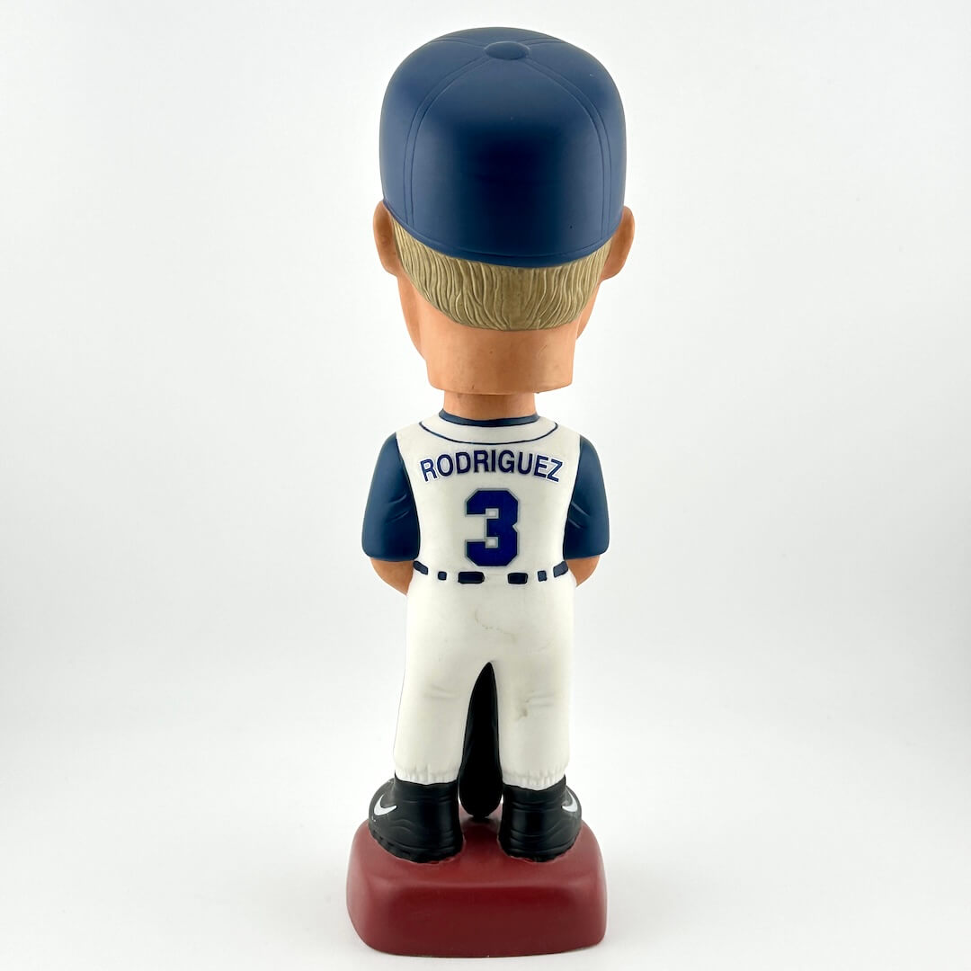 Bobblehead figure of a baseball player in a blue and white uniform with 'Rodriguez' and number '3' on a white background.