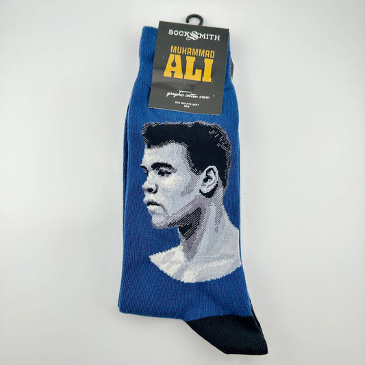Blue sock with Muhammad Ali design and Socksmith label on a white background
