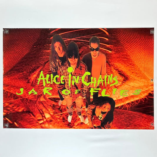Poster of Alice in Chains with 'Jar of Flies' album text on a red and orange background