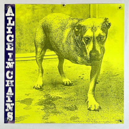 Album cover for 'Alice in Chains' with a dog and yellow background