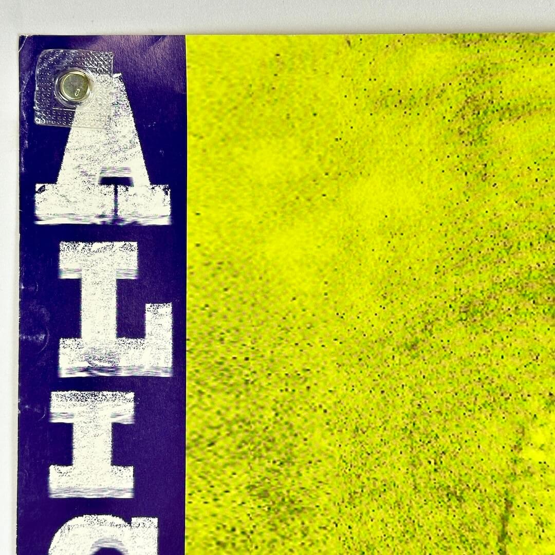 Top left corner of poster with some wear to left edge. 