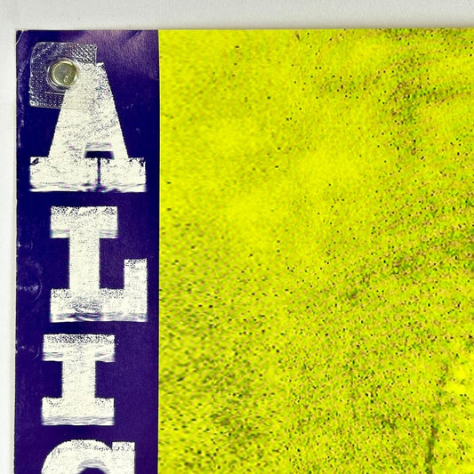 Top left corner of poster with some wear to left edge. 