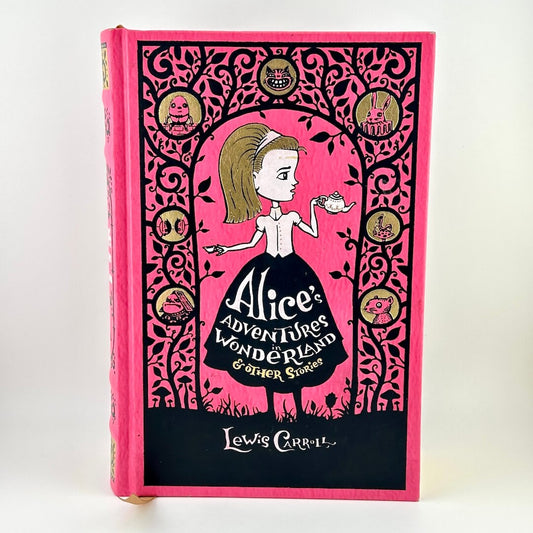 Book cover of 'Alice's Adventures in Wonderland' with decorative pink and black design.