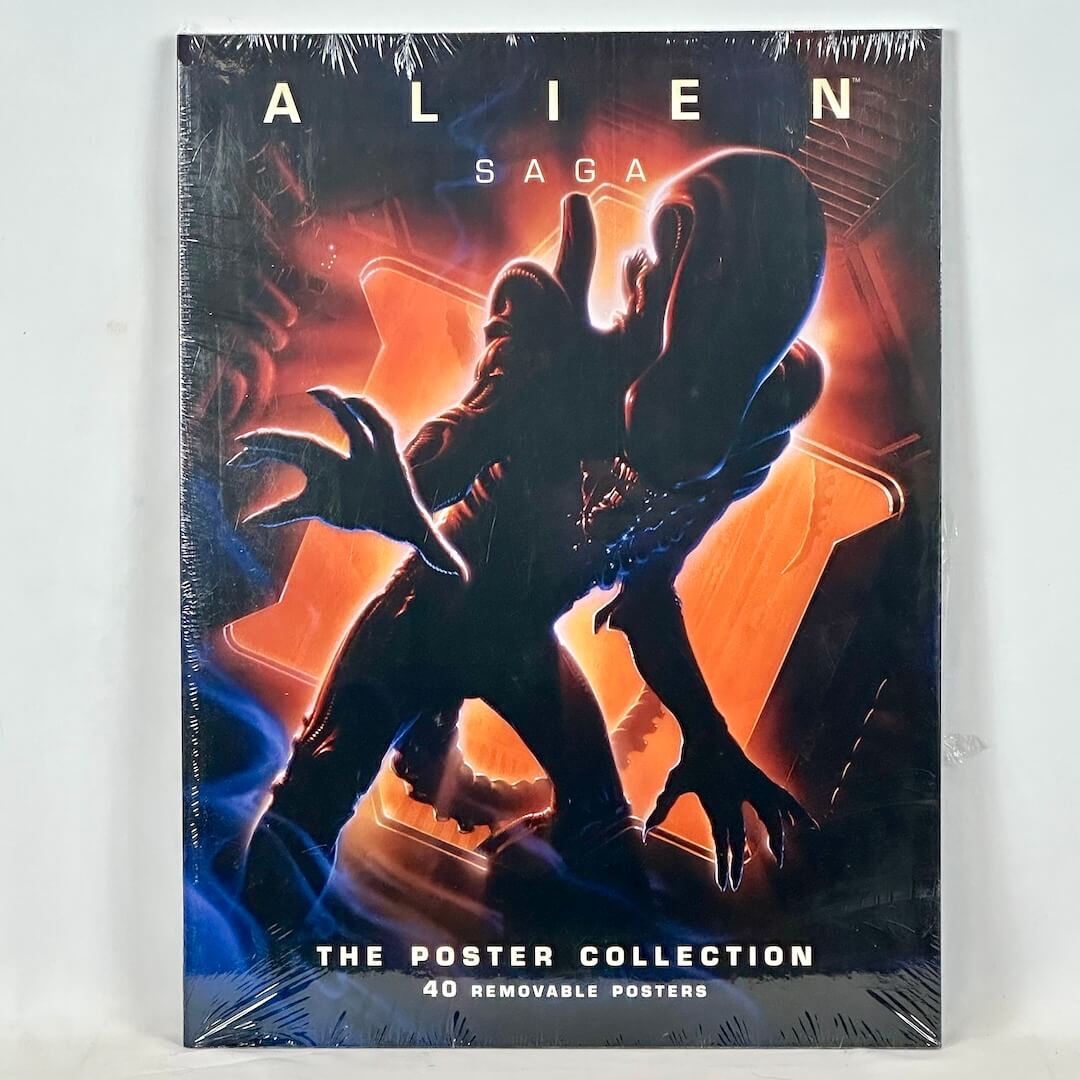 Alien Saga Poster Collection book with image of Giger's Alien in center. 