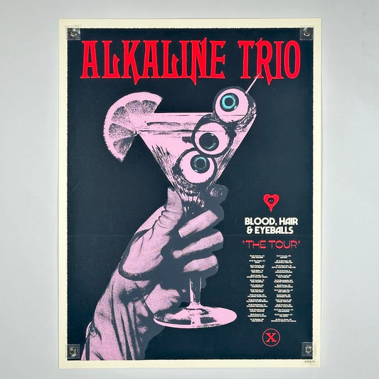 Poster of Alkaline Trio with a hand holding a cocktail with eyeball design on a dark background.