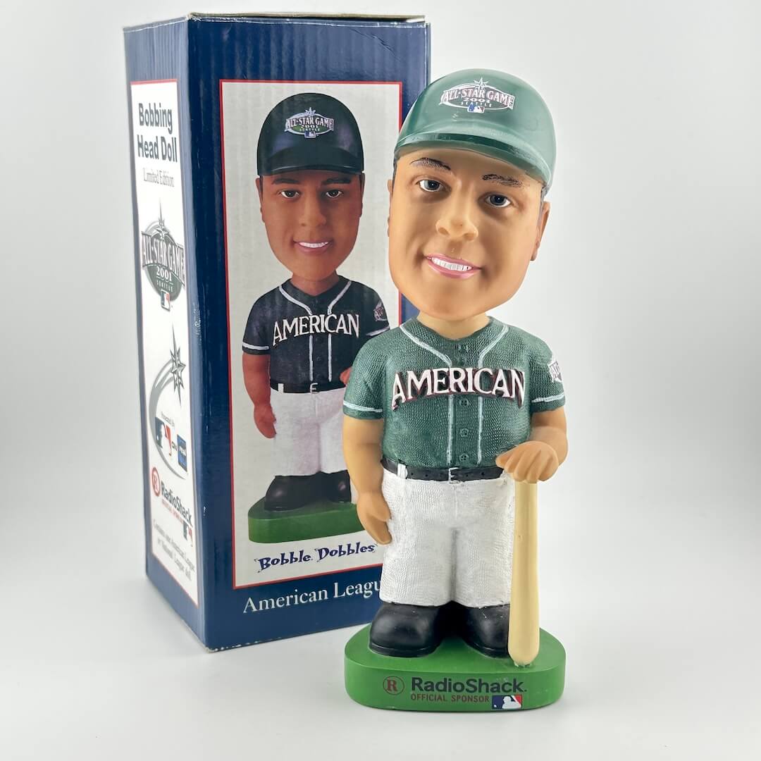 Baseball bobblehead figure with packaging on a white background