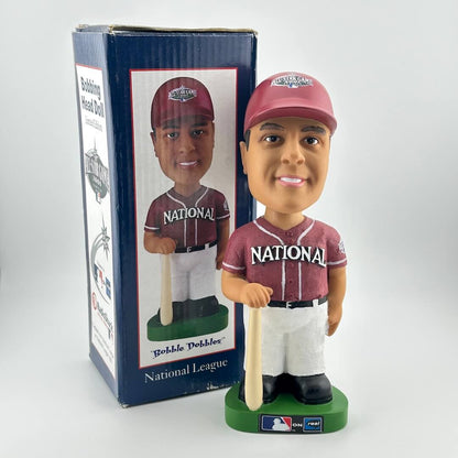 Baseball bobblehead figure with packaging on a white background