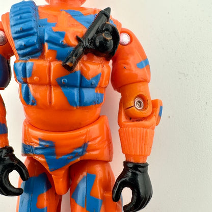 Close-up of an orange and blue action figure with black gloves on a light gray background