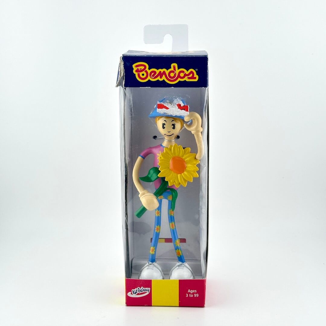 Colorful Bendy toy figure in packaging with Bendie branding on a white background