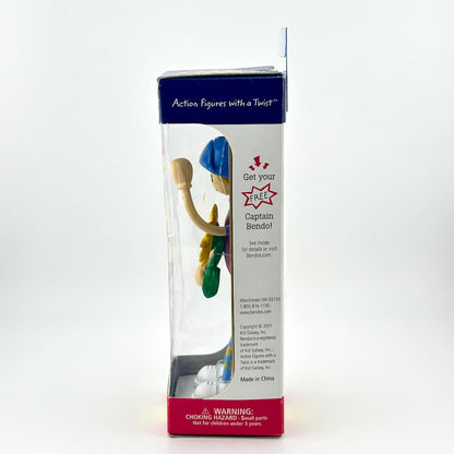 Toy figure in a clear packaging box with branding on a white background
