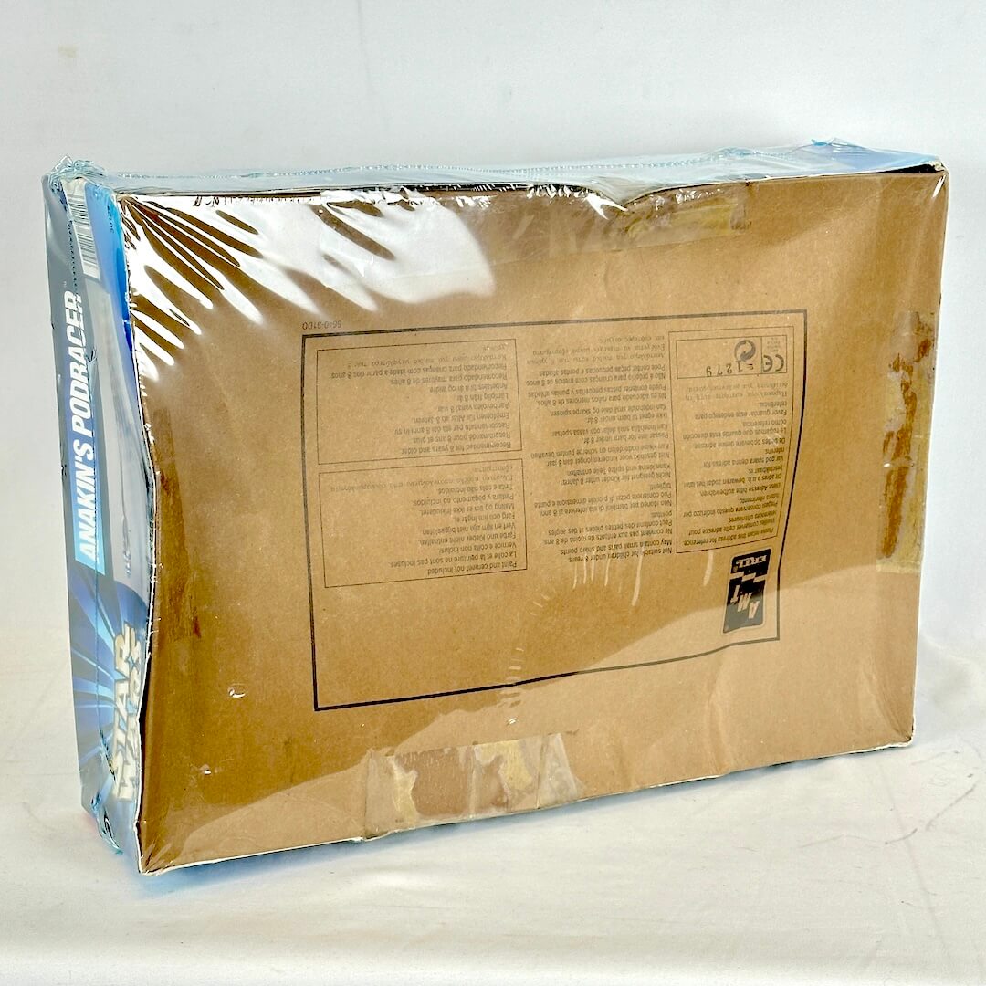Cardboard box with clear plastic wrap on a white background
