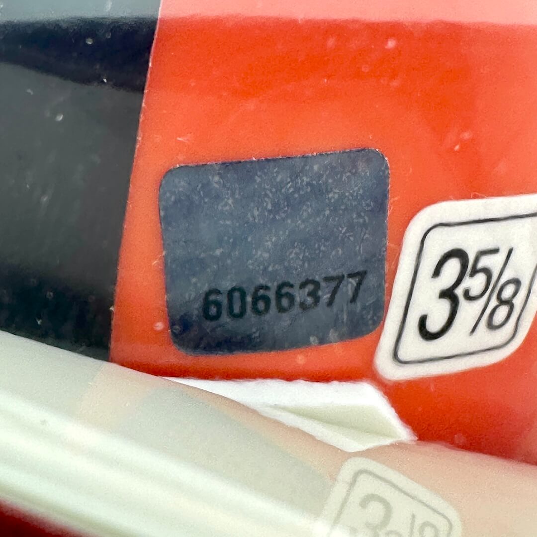 Close-up of authentication and size stickers. 