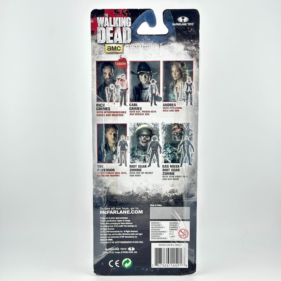 Back packaging of a McFarlane Toys Walking Dead collectible figure, featuring character artwork and product details.
