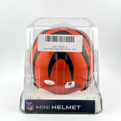 Orange mini football helmet in clear packaging with NFL logo on a white background