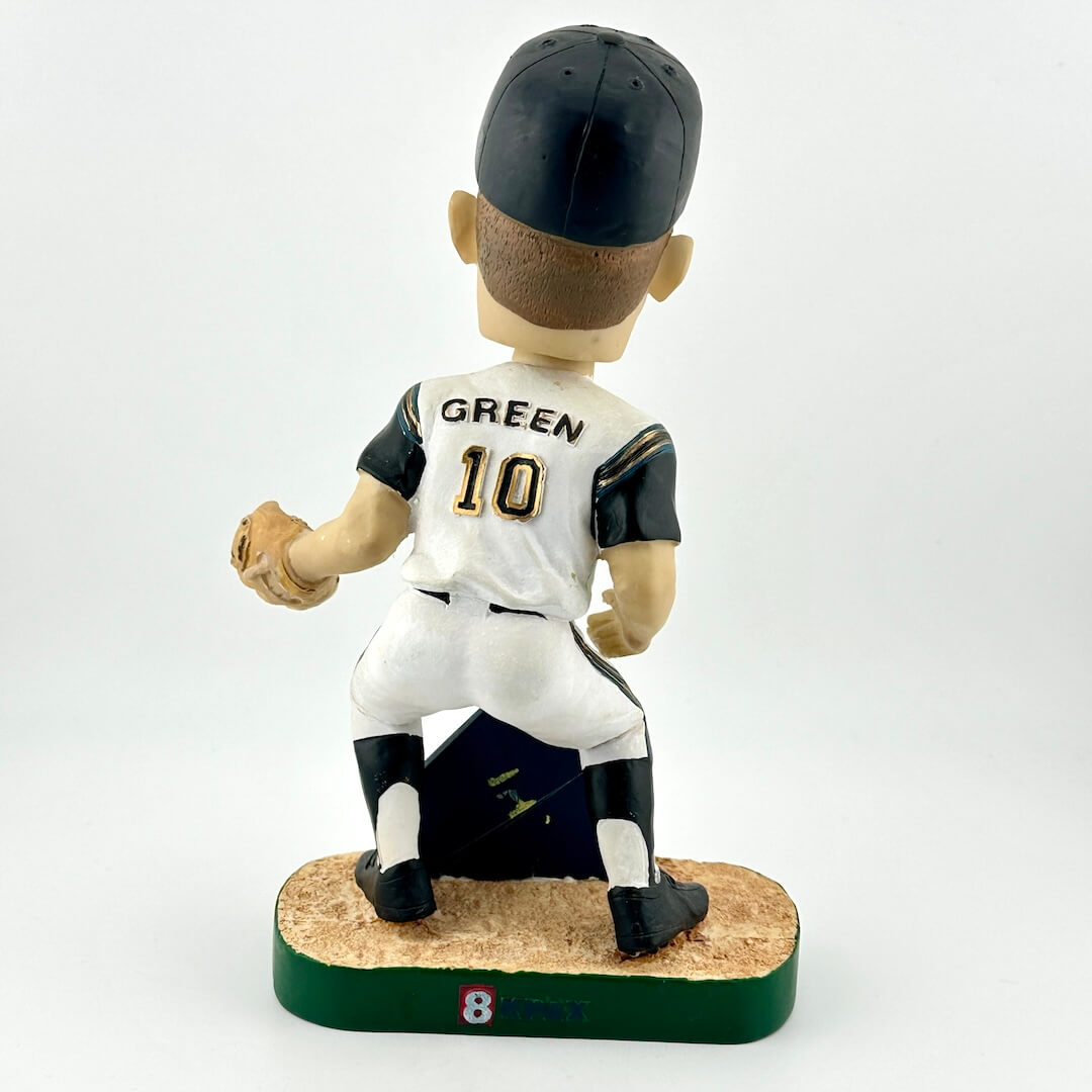 Baseball bobblehead figure with 'Green' and number '10' on a white background