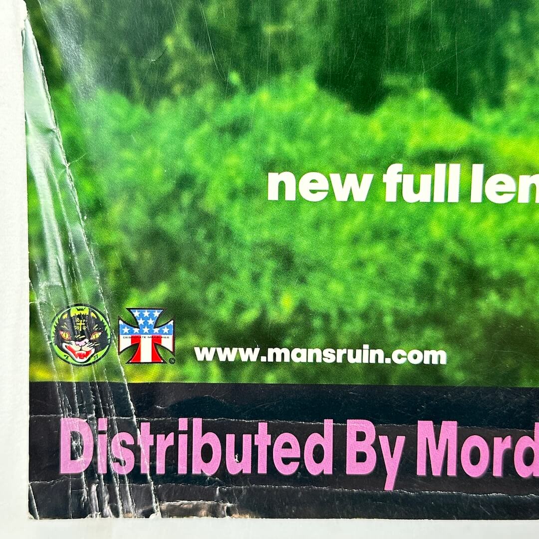 Promotional image with text 'new full len' and website 'www.mansruin.com', distributed by Mord, on a green background.