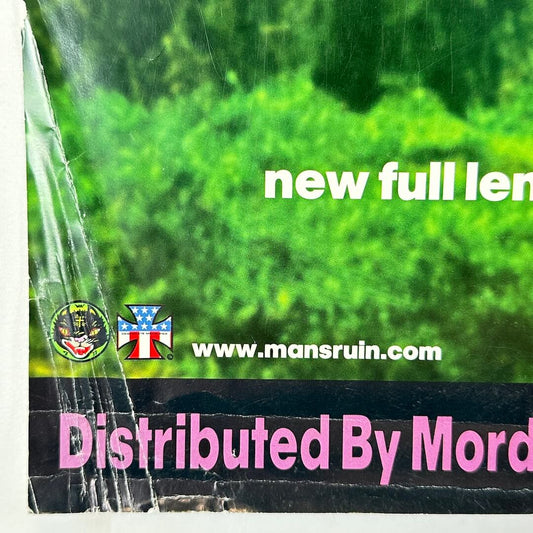 Promotional image with text 'new full len' and website 'www.mansruin.com', distributed by Mord, on a green background.