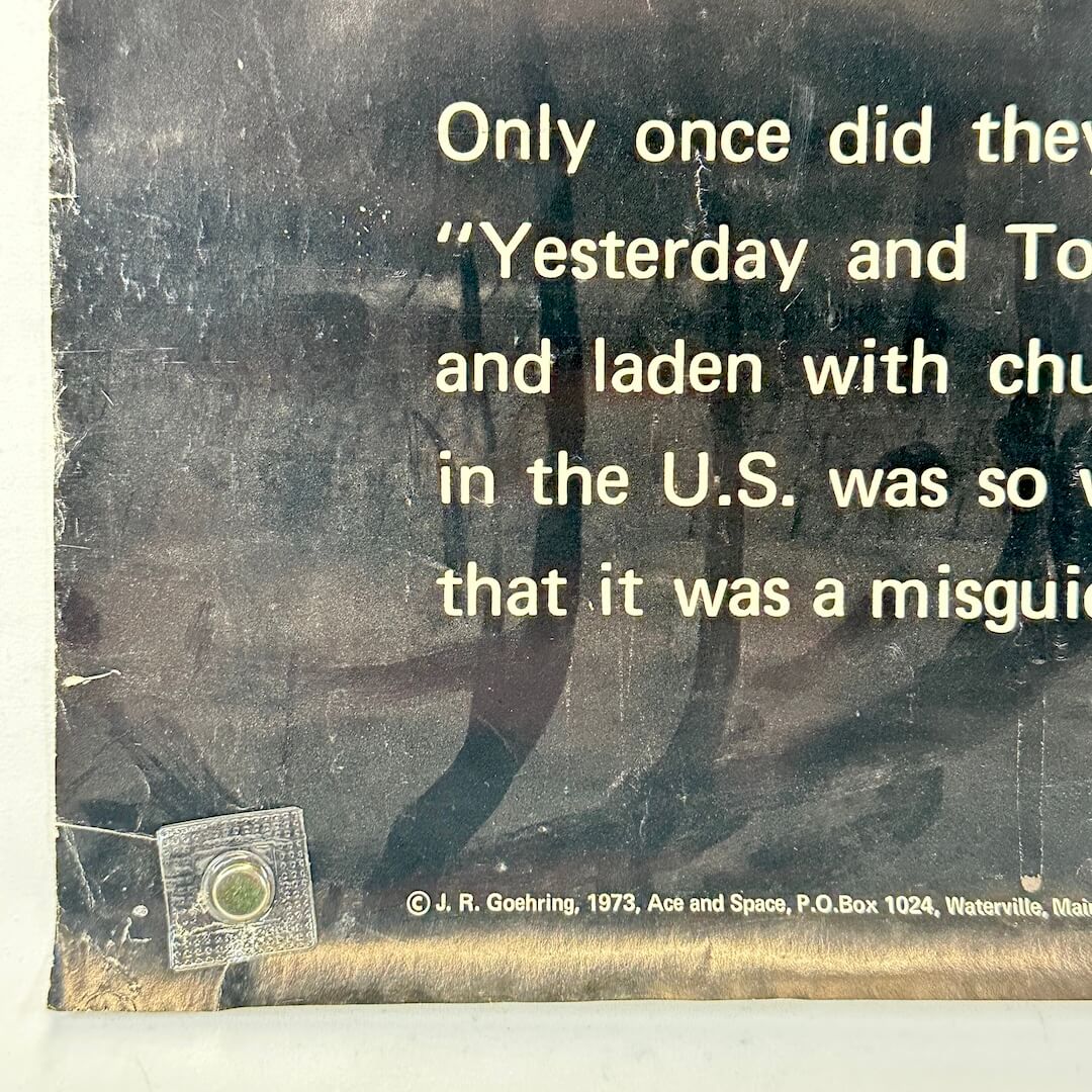 Bottom left corner of poster with some creases, pin holes, and wear to left edge. 