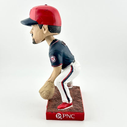 Bobblehead figure of a baseball player in a red and blue uniform with a PNC logo.