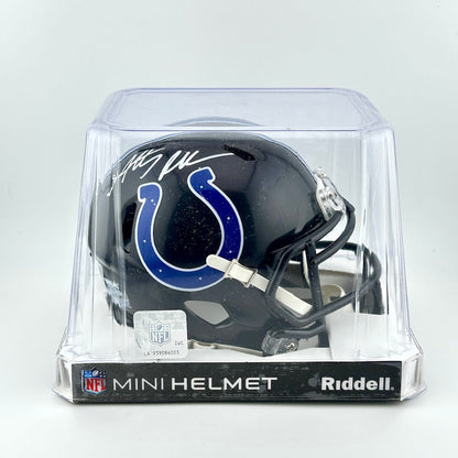 Riddell mini football helmet in clear packaging on a white background