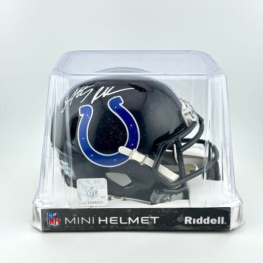 Riddell mini football helmet in clear packaging on a white background