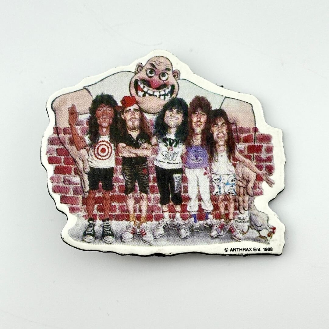 Pin of band animated in front of brick wall with man standing behind it. 